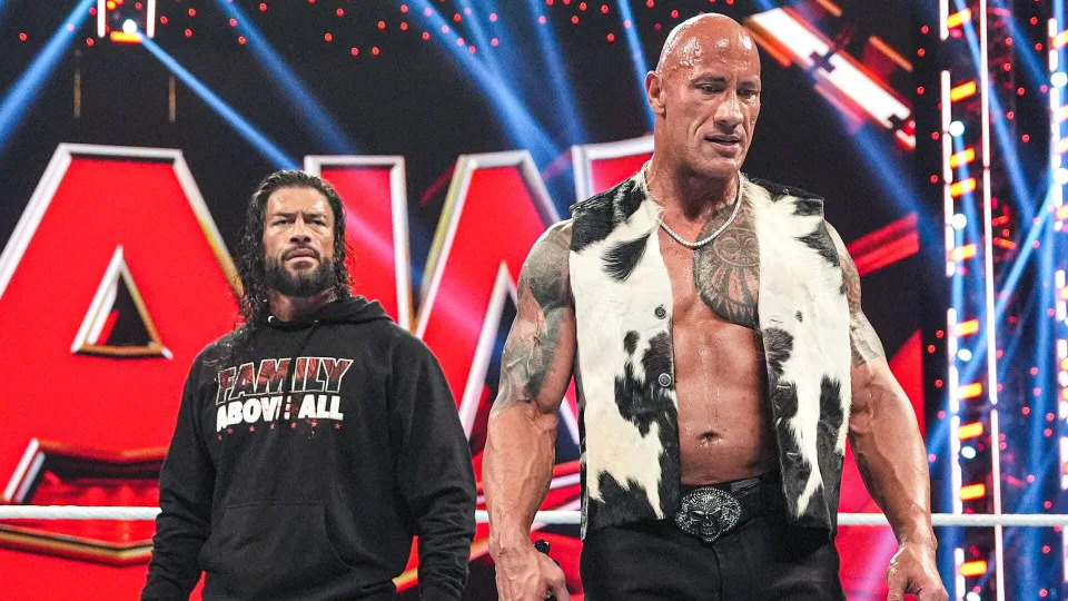 Dwayne "The Rock" Johnson (right) has returned to the WWE ring as a villain and is tag-teaming with cousin Roman Reigns at WrestleMania XL April 6-7, 2024.