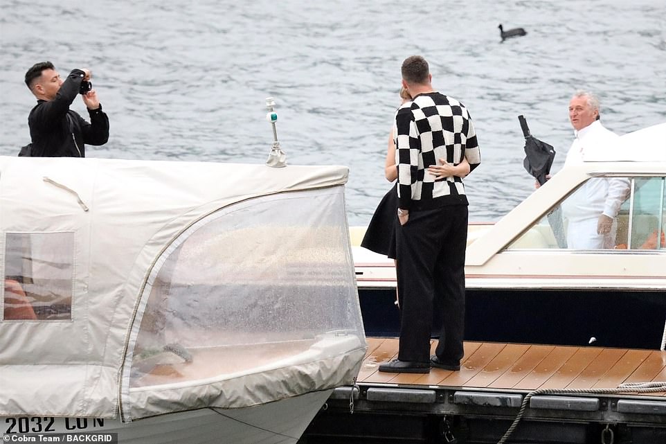 The couple were seen posing for a sweet snap before boarding the boat