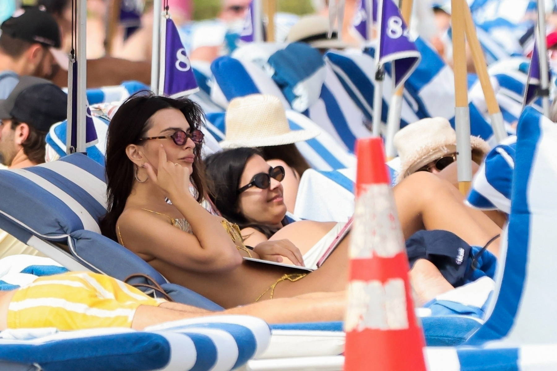 Emily Ratajkowski looks stunning in a string bikini while enjoying a  relaxing beach day in Miami, Florida-160224_13