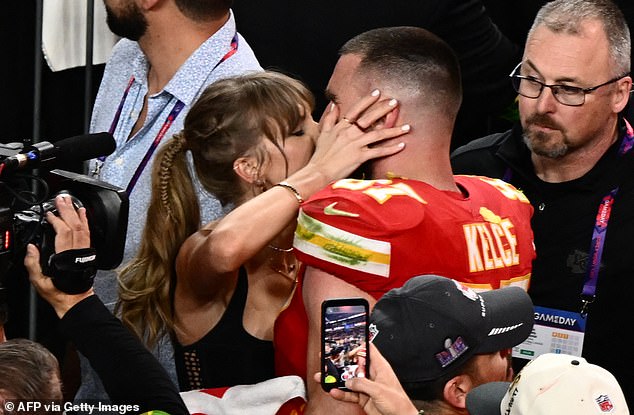 Her NFL star boyfriend Travis Kelce, 34, is said to be joining her on the rural countryside for a getaway (pictured kissing at the Super Bowl after Kansas City's win)