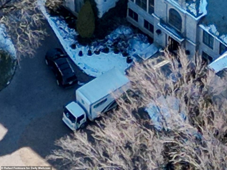 A moving truck was seen Tuesday outside of Travis Kelce's new $6million Kansas City mansion