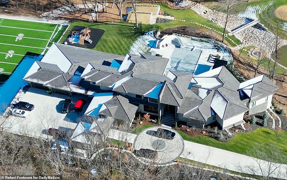 Taylor and Travis spent several hours at the Kansas Chiefs Quarterback's newly built mega-mansion - which features a full-length football field with his name in the end zone and his logo on the 20 yard line