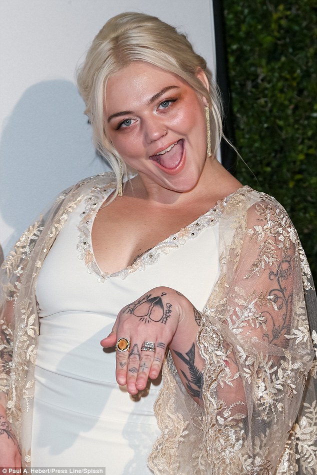 Elle King showed off some interesting ink on her hand as she mugged for the cameras