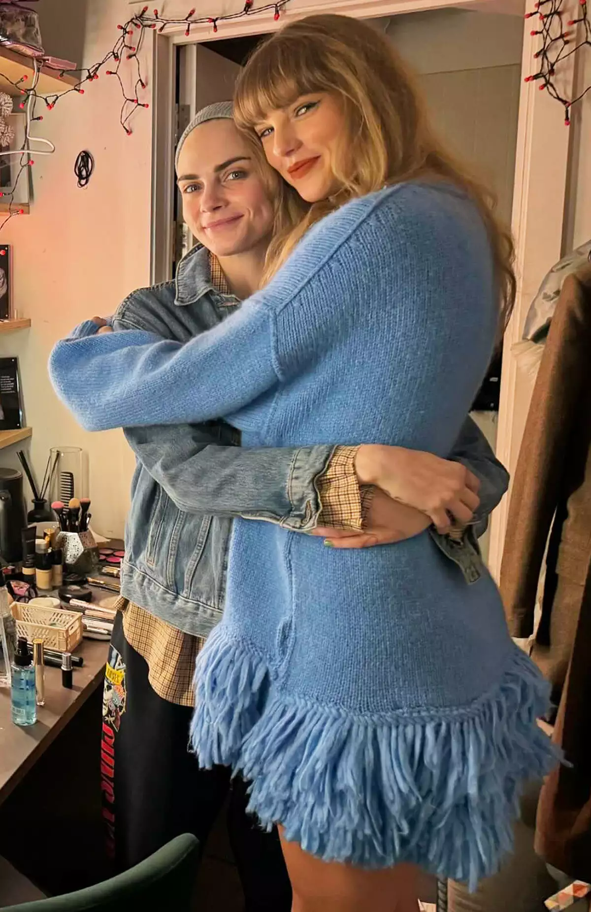 Cara Delevingne and Taylor Swift hugging backstage at Cabaret!