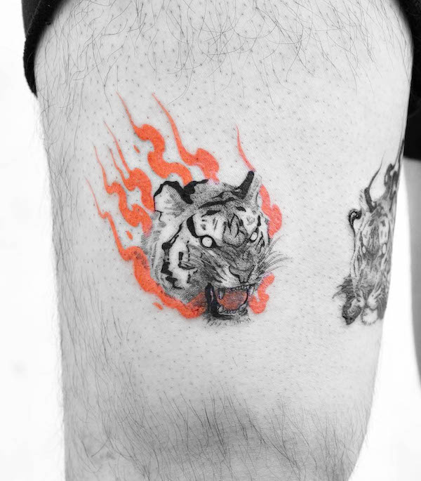 Fiery tiger tattoo by @wilwang_tatt