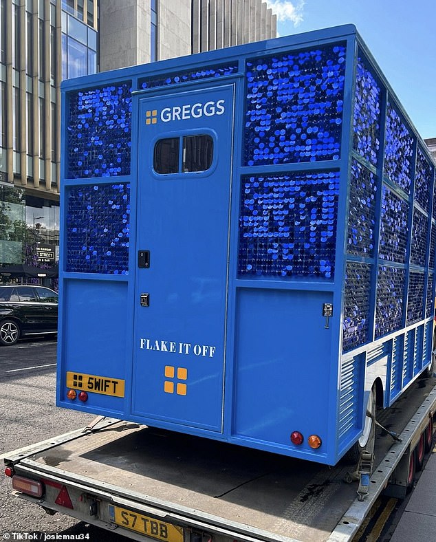 The blue food truck, complete with glitter, featured the lyrics 'Flake It Off' across the back - a play on her hit track, Shake It Off