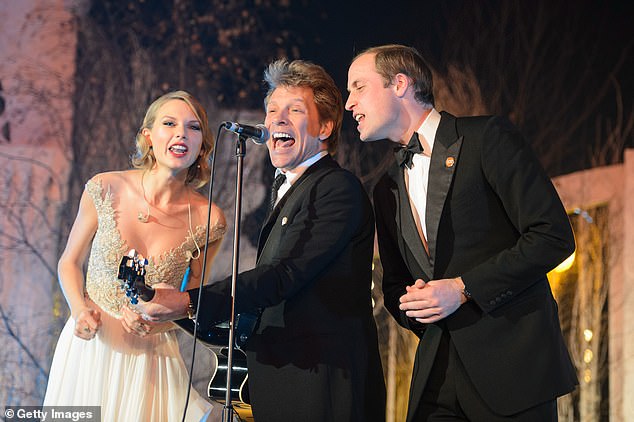 Taylor Swift, Jon Bon Jovi and Prince William are pictured singing Livin' On A Prayer on stage at the Centrepoint Gala Dinner at Kensington Palace in London on November 26, 2013 - after the royal obeyed 'like a puppy' her suggestion he join her