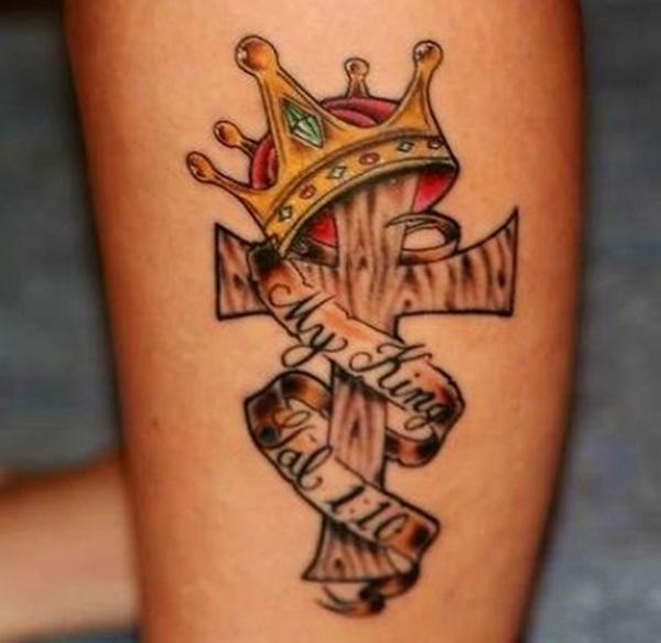 Cross with crown and words tattoo