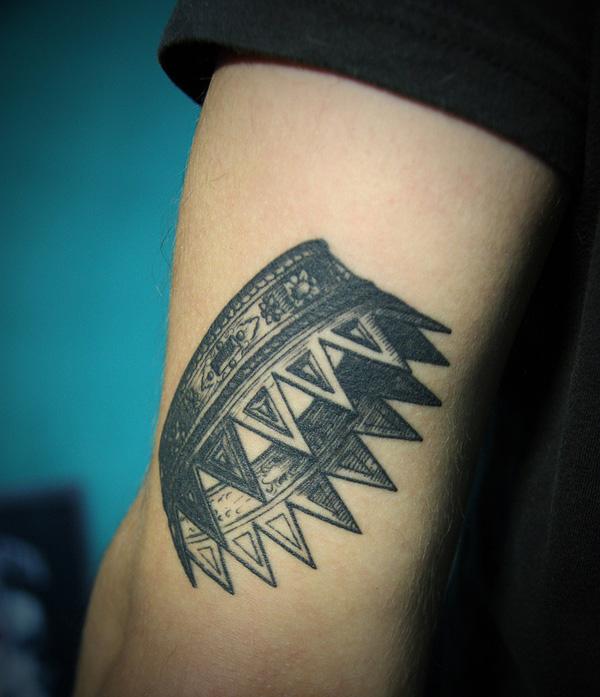 Black and white crown sleeve tattoo