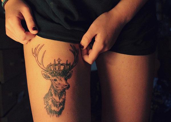 Deer crown tattoo on thigh