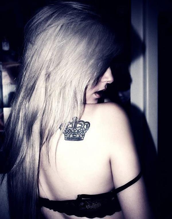 Black and grey crown back tattoo