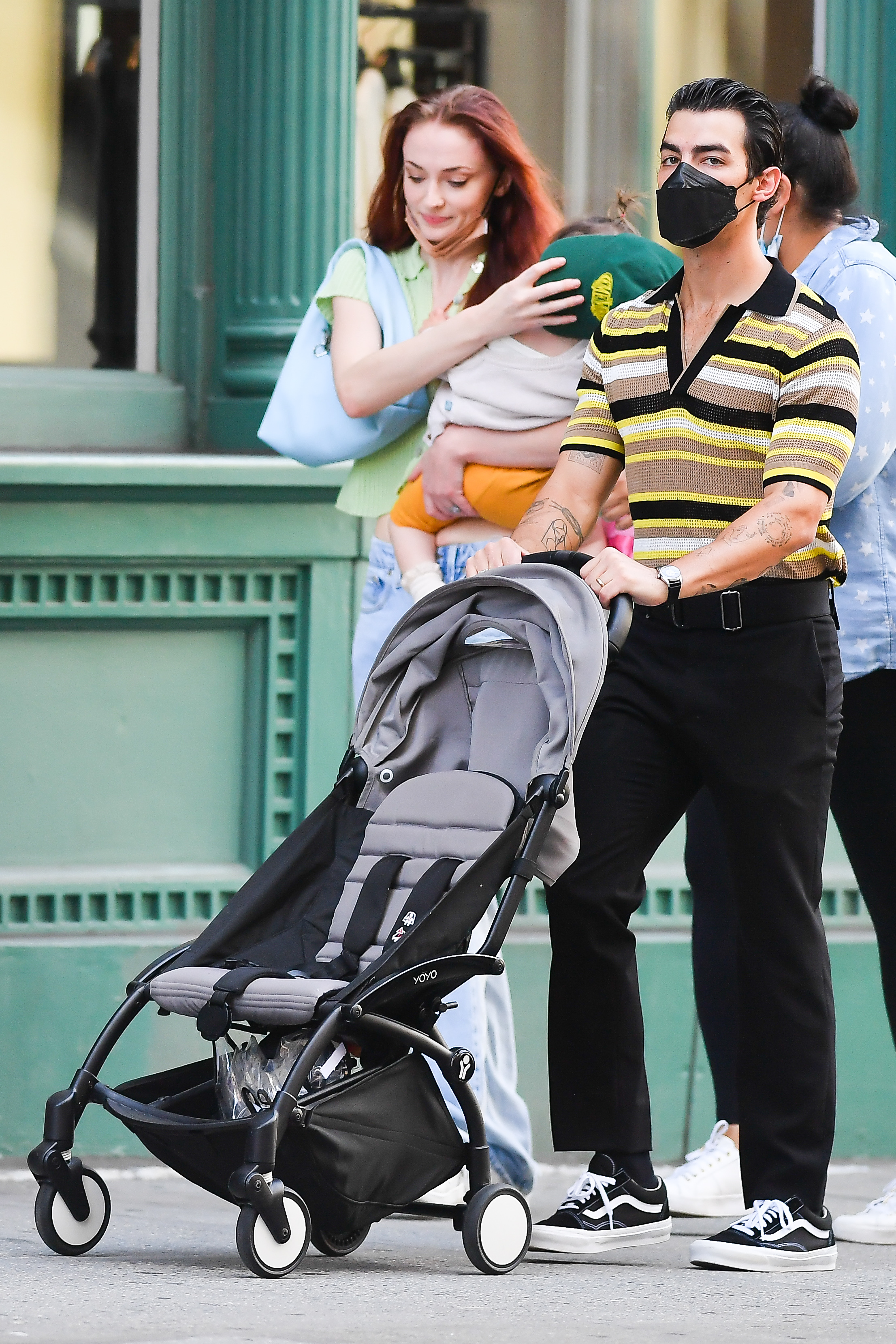 Sophie Turner and Joe Jonas walking with their kids