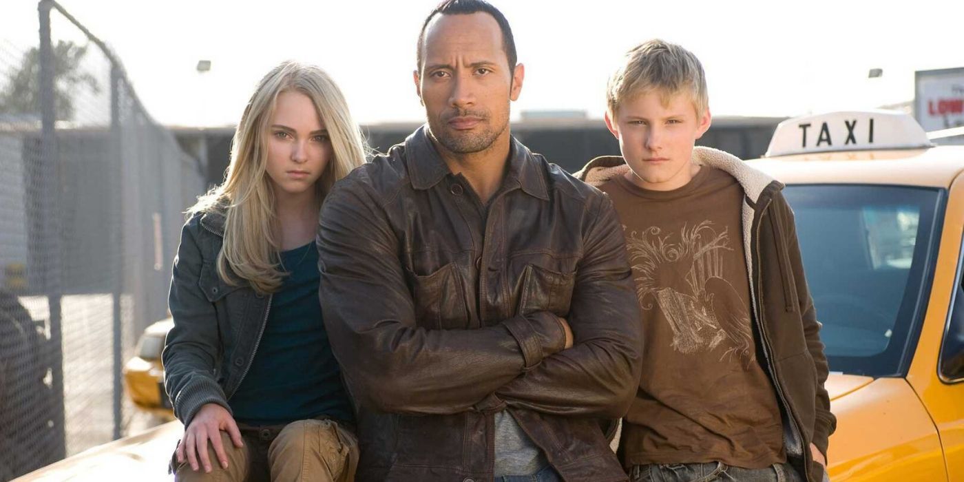 Jack, Sara, and Seth sitting on a cab Race To Witch Mountain