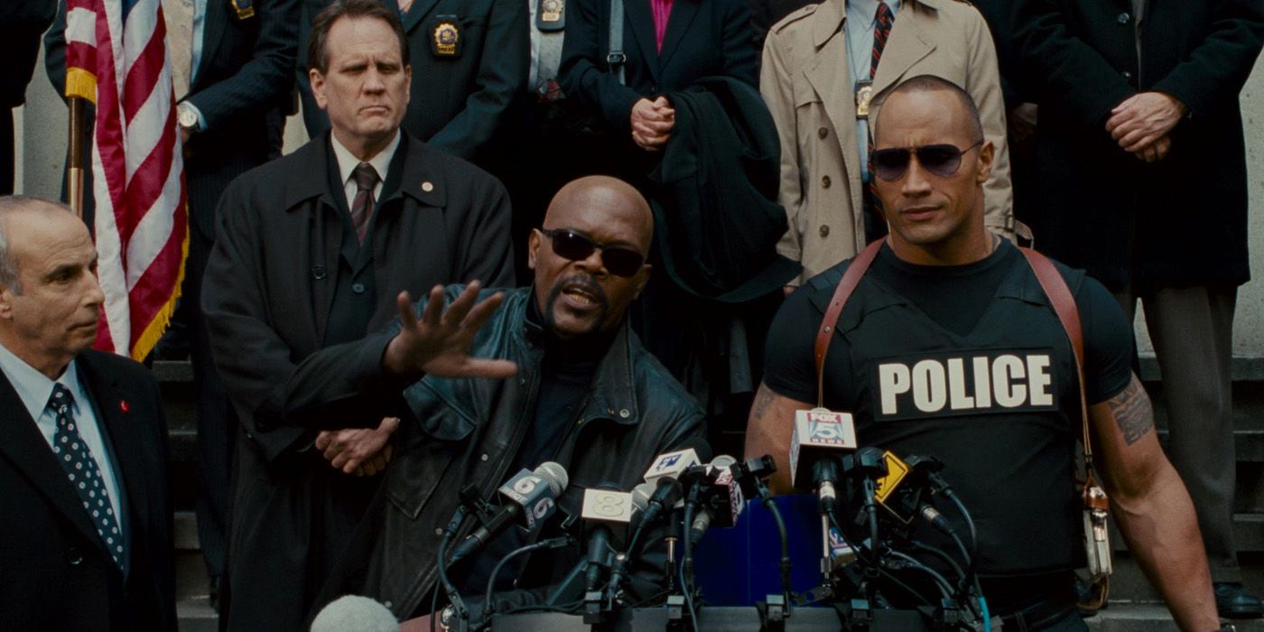 Sam Jackson and Dwayne Johnson (The Rock) in a press conference in The Other Guys