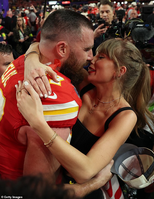 This comes as Swift fans are convinced that the pop star is 'secretly engaged' to her partner Travis Kelce - pictured February 2024