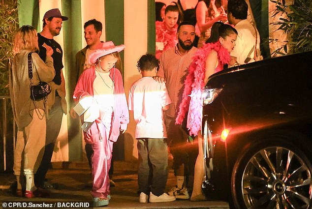 Saying goodbye: The large group was seen mingling outside as they all gathered outside while leaving the San Vicente Bungalows