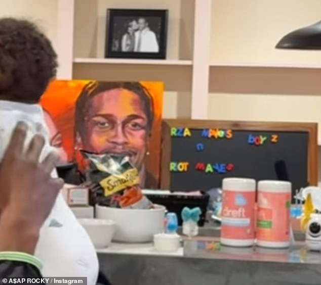 There was an adorable black and white snap of Rihanna and Rocky cosied up as well as a bright orange and red painting of the pair. A magnet board was also on display