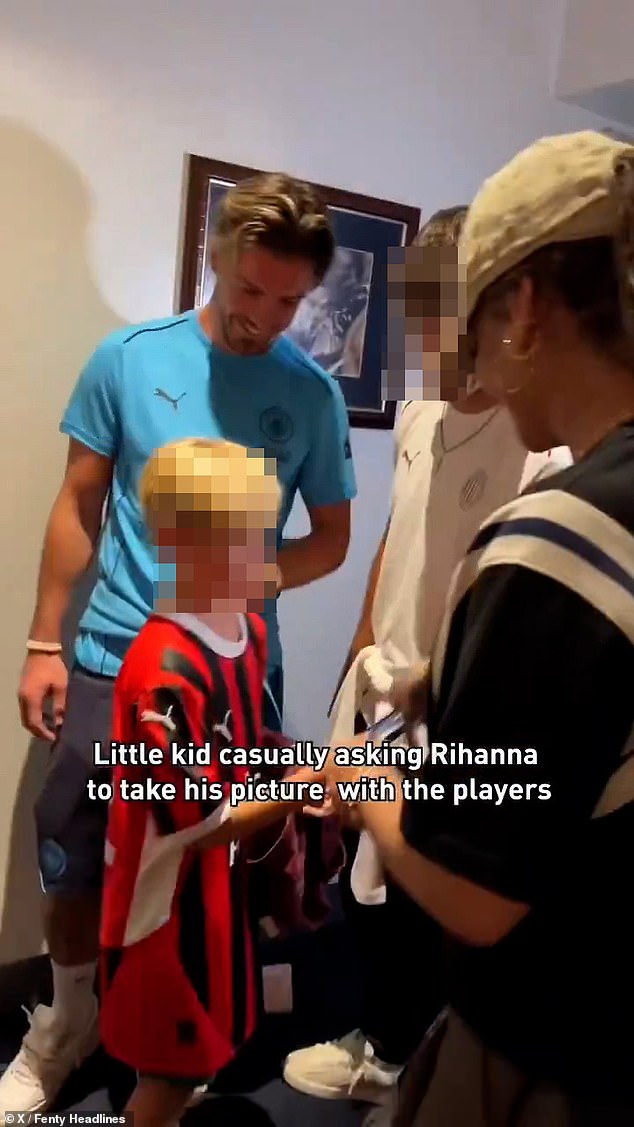 But one fan who was also in the room then approached Rihanna and, seemingly not recognising her, asked her to take a photo of him with the footballers