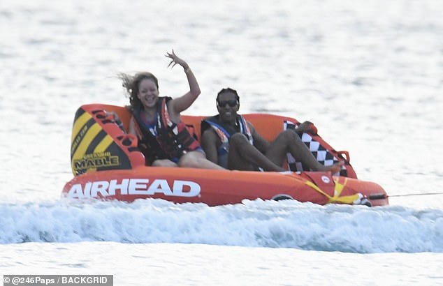 She and Rocky clung onto the boat as it was sent flying through the ocean