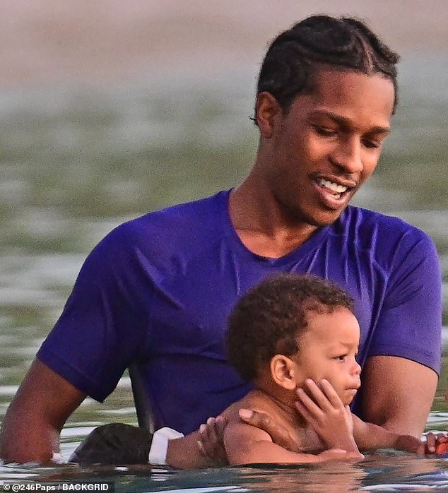 A$AP, born Rakim Mayers, was dressed in a purple T-shirt and black swim trunks as he doted on Riot