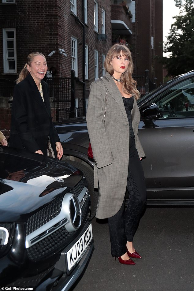 Taylor arrived at the upmarket London restaurant with her old friend Este Haim