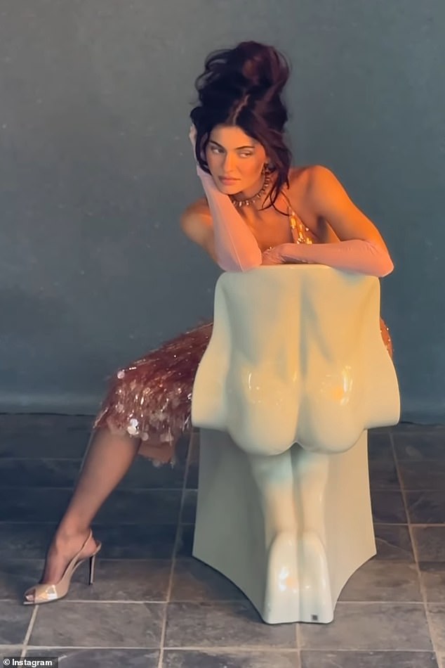 Kylie Jenner appeared on Instagram Wednesday evening to share behind-the-scenes outtakes from her British Vogue cover shoot