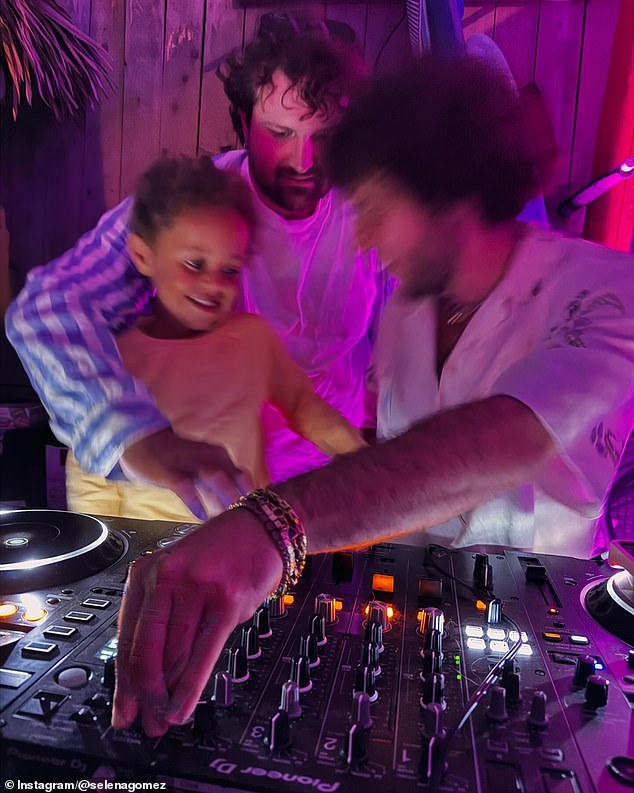 Benny was shown DJing