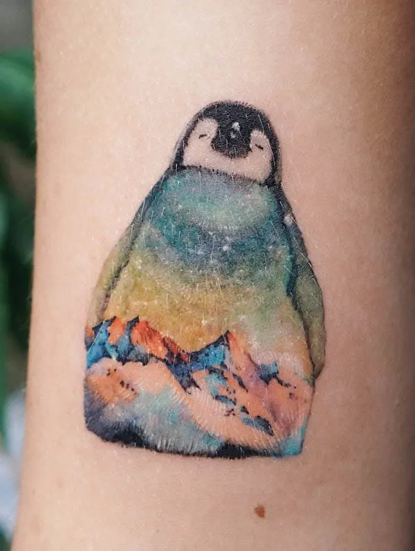 Watercolor landscape penguin tattoo by @abii_tattoo