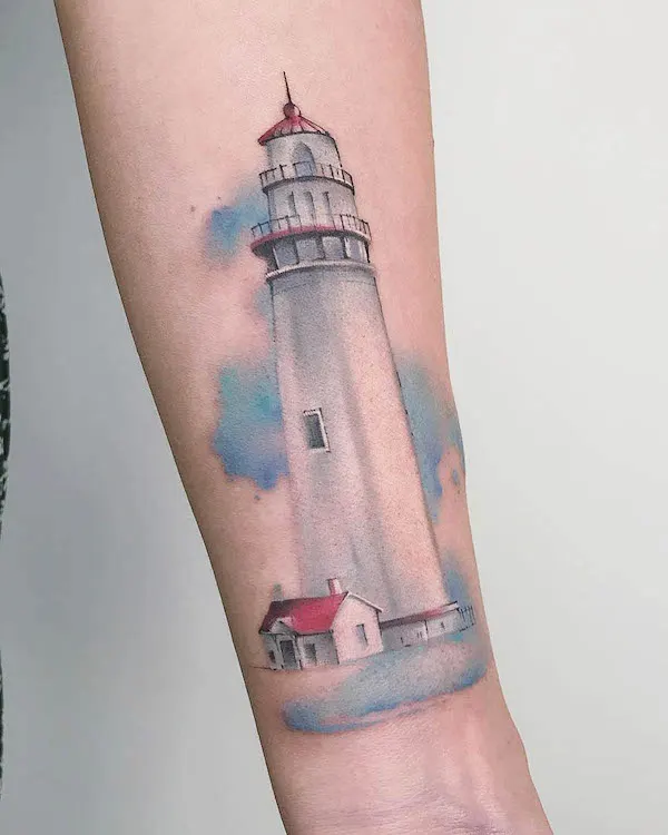 Watercolor lighthouse tattoo by @goldfishtattoo