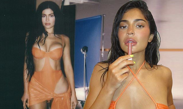 Kylie Jenner almost SPILLS OUT of her bikini top as she plugs her glossy  pink lip balm | Daily Mail Online