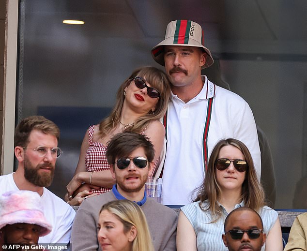 Taylor Swift and Travis Kelce defied fake romance rumours as they put on a loved-up display at the US Open final together in New York City on Sunday