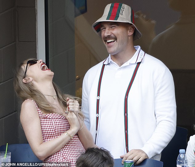 The loved-up duo could not stop laughing as they headed out together for the match