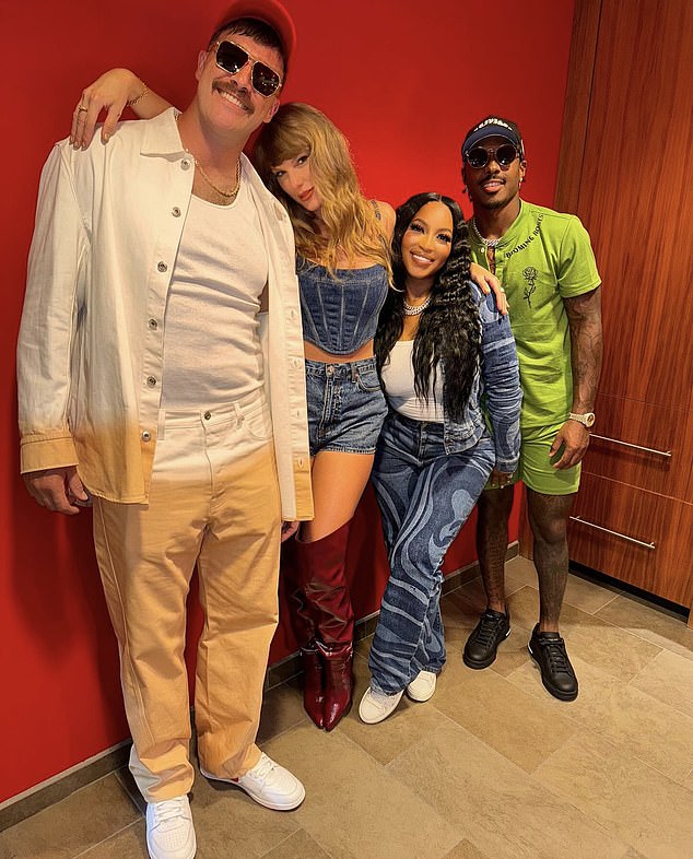 The couple pose with Kelce's teammate Mecole Hardman Jr (right) and his girlfriend Chariah Gordon (second from right) after Thursday's victory over Baltimore