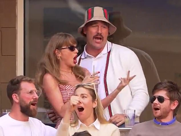 Fans have ripped into Taylor Swift and Travis Kelce over their 'trash' antics at the US Open final after belting out an iconic 2000s rock song in a 'pure cringe' moment