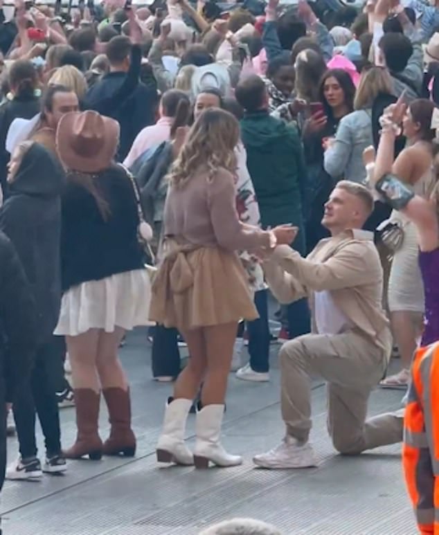 This is the adorable moment a man proposed to his girlfriend at Taylor Swift's Eras Tour in Liverpool on Saturday as Love Story played in the background in an adorable clip caught on camera