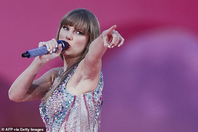 Taylor Swift performs on stage as part of her Eras Tour in Lisbon on May 24