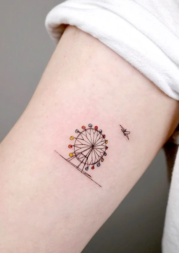 Small Ferris Wheel inner arm tattoo by @tattoo_joojoo