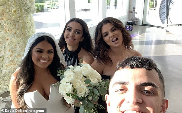 Say cheese! The wedding party even found a moment to strike a pose for a selfie