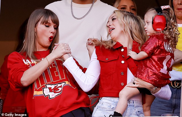 Brittany and Taylor showed off the special celebratory handshake they had created when the Chiefs played the Chargers later that month