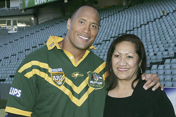 Actor Dwayne "The Rock" Johnson poses with his mother Ata after receiving the Australian Rugby League official "Kangaroo" Jersey from a selection of...