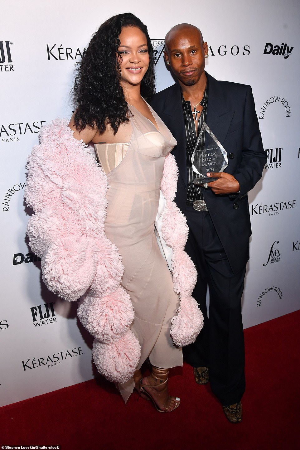 She made a surprise appearance at the event to present the Magazine Of The Year award to Katie and her friend Jahleel Weaver, for their Perfect mag; pictured with Jahleel